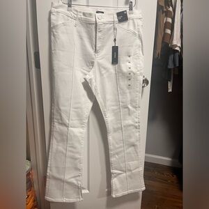 Skyscraper midrise white jeans